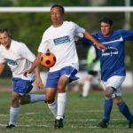 men playing soccer