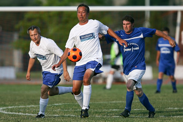 men playing soccer