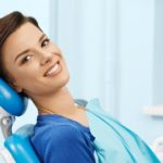 woman smiling in dental chair