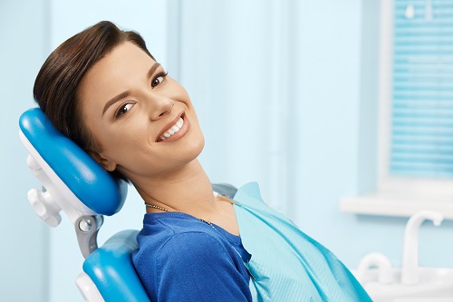 woman smiling in dental chair