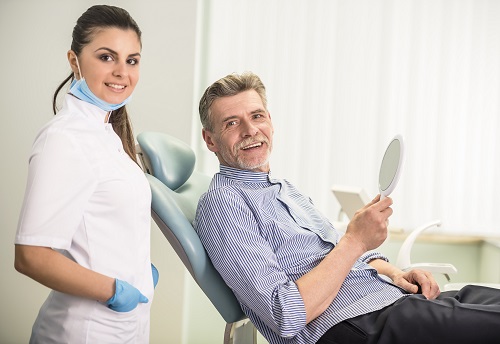 hygienist with patient